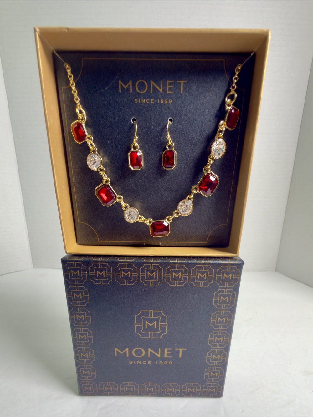 Monet Gold Tone Necklace and Earring Set with Deep Red and Clear Stones
